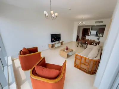 a living room with chairs and a couch and a table at Luxury Holiday Home Just Minutes from Dubai's Global Village Your Perfect Getaway!