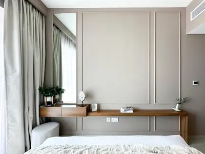 a bedroom with a bed and a desk and a window at Sky High Luxury 50th FLR Lux 2BDR Apartment in Downtown in Dubai