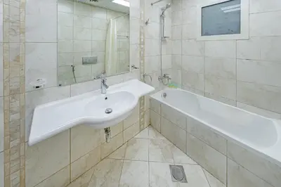 a bathroom with a sink and a bath tub at Full Sea View in Dubai Marina - Balcony & Pool in Dubai