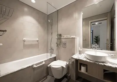 a bathroom with a sink and a tub and a toilet at Bright High Floor Apartment in a 5 Star Hotel Resident Tower w Burj View and access to 64th Infinity Pool, Gym, Sauna, Spa, Restaurants, Bars and more in Dubai