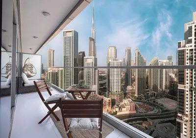 a balcony with a view of a city skyline at Bright High Floor Apartment in a 5 Star Hotel Resident Tower w Burj View and access to 64th Infinity Pool, Gym, Sauna, Spa, Restaurants, Bars and more in Dubai