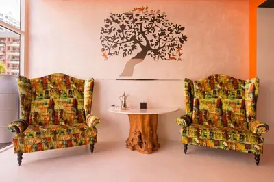 two chairs and a table in a room at Jannah Place Dubai Marina in Dubai