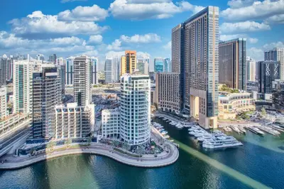 an aerial view of a city with tall buildings at ShoresInn - Spacious unit with Dubai Marina View in Dubai