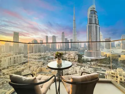 a balcony with a view of a city at Luxury - Fountain Show & Burj Khalifa View - 2 BR - 3 beds in Dubai