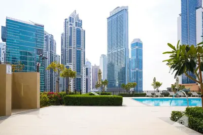a view of a city skyline with a swimming pool at Luxury Burj Crown Downtown Balcony & View in Dubai