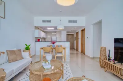 a living room with a couch and a table at ShoresInn - Outdoor Retreat with Private Terrace in Dubai