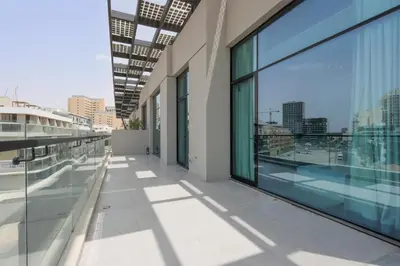 an empty building with a view of the city at Livbnb - Stay at Signature Livings Penthouse, JVC in Dubai