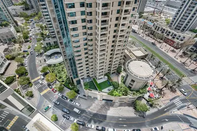 an aerial view of a city with a tall building at Premium Home Minutes away from Burj Khalifa in Dubai