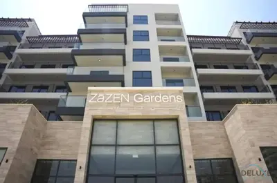 a building with a sign that reads zen garden gardens at Captivating 1BR Apartment in Zazen Gardens, Al Furjan by Deluxe Holiday Homes in Dubai