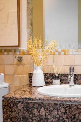 a bathroom with a sink and a toilet at Daniels 2BR at Rimal JBR with Marina View in Dubai