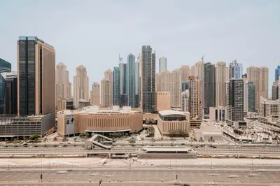 a view of a city with many tall buildings at Blueground DIFC swimming pool gym security DXB-1545 in Dubai