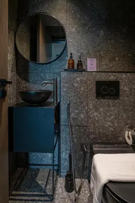 a bathroom with a sink and a mirror at Stylish 1BR with Dubai Skyline & Burj Khalifa View in Dubai