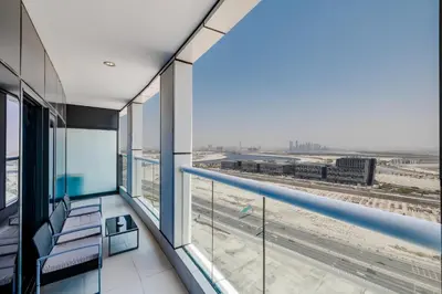 an office balcony with a view of an airport at ALiving Modern & Chic 1BR I Paramount Tower D -2203 in Dubai