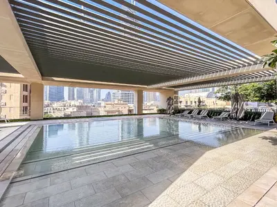 a swimming pool on a building with a view at Luxury Home on the 50th Floor with Full Burj View in Dubai