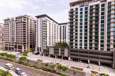 an aerial view of tall buildings in a city at Fully Equipped Residence at One Park Avenue in Dubai