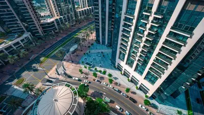 an aerial view of a city with tall buildings at Burj and fountain view 3BHK Near Dubai Mall in Dubai