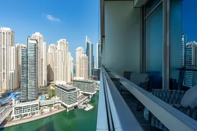 a view of the city from the balcony of a building at Luxury Apartment in Dubai Marina w Stunning View in Dubai