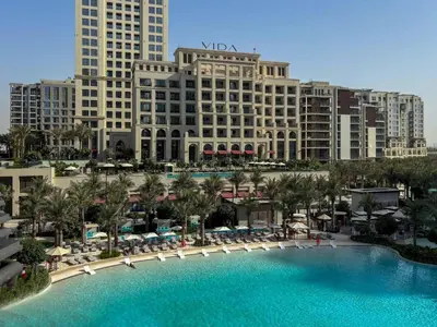 an aerial view of the mgm resort with a large pool at Frank Porter - Vida Creek Beach in Dubai