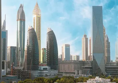 a group of tall buildings in a city at Stylish Flat in Downtown Dubai with PS5 Gym and Pool in Dubai