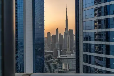 a view of a city skyline from a skyscraper at Dubai Paramount 1BR APT Burj Khalifa view in Dubai
