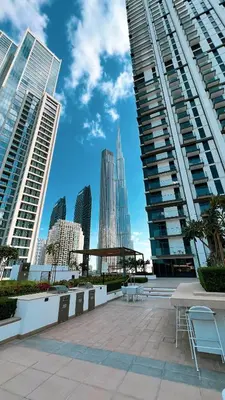 a view of a city skyline with tall buildings at Luxury High Floor Apartment with Downtown Boulevard View Opposite Dubai Mall in Dubai
