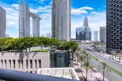 a view of a city skyline with tall buildings at Elegant & Cozy 2BR Home in the Heart of Downtown in Dubai