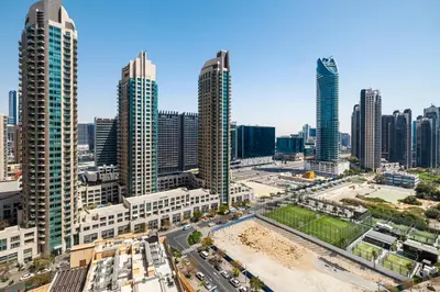 an aerial view of a city with tall buildings at 1BR Burj Royale Near Dubai Mall Downtown in Dubai