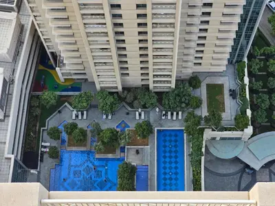 an overhead view of a building with a pool at Downtown Gem, Full Burj Khalifa & Dubai Fountain Views, Luxury Amenities in Dubai