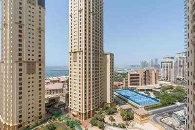 an aerial view of a city with tall buildings at Vacay Lettings - Spacious 3 Bedroom at JBR walk in Dubai