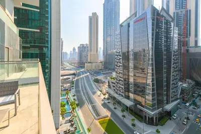 an aerial view of a city with tall buildings at 2 BR with Maid's Next to Dubai Mall Mada Residences in Dubai