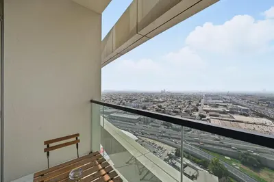a balcony with a view of a city at Brand new Business Bay location in Dubai