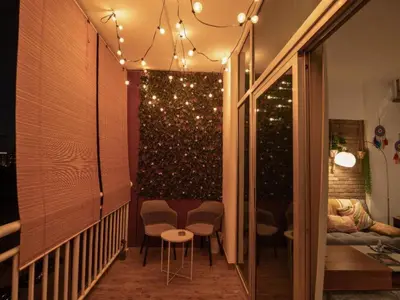 a hallway with a wall with christmas lights at Al Barsha South Fourth in Dubai