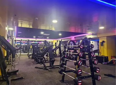 a gym with lots of equipment in a room at Capsule Room in Business Bay Near Downtown in Dubai