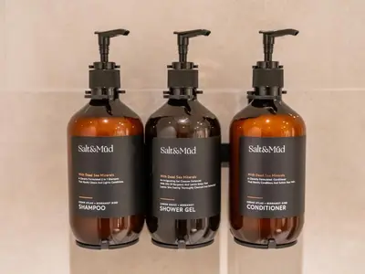 a group of three bottles of soap on a shelf at Panoramic Downtown & Fountain views from High Floors at Forte by Propigo in Dubai