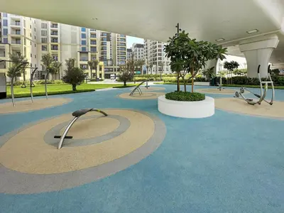 a building with a park with a playground at Dubai Creek in Dubai
