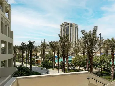 a view of a resort with a pool and a building at Dubai Creek in Dubai