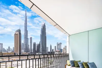 a view of a city skyline from a balcony at Premium Downtown Home with Burj Khalifa View in Dubai