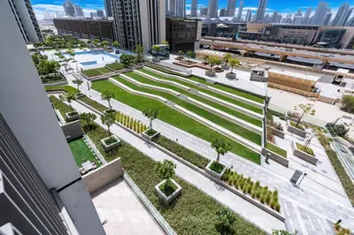an aerial view of a park in a city at Premium Downtown Home with Burj Khalifa View in Dubai