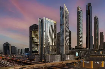 a city skyline with tall buildings and a highway at Vida Dubai Mall in Dubai