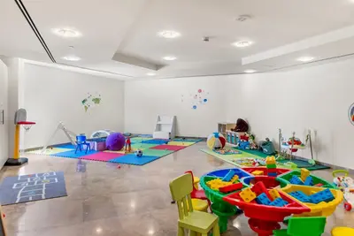 a room filled with lots of play equipment at DIFC Downtown Dubai - Exclusive 1 BR in Dubai