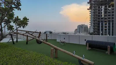 a playground on the roof of a building at Luxury 2 Bedroom Poolside Haven in Dubai Creek Harbour in Dubai