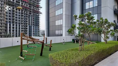 a playground on the roof of a building at Luxury 2 Bedroom Poolside Haven in Dubai Creek Harbour in Dubai