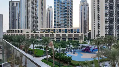 a view of a resort with tall buildings at Luxury 2 Bedroom Poolside Haven in Dubai Creek Harbour in Dubai