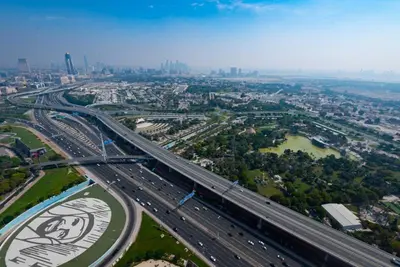 an overhead view of a highway with traffic on it at Dubai Luxe Haven - World Record Residence in Dubai