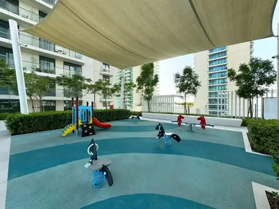 a playground in a building with children playing at 2BR Beachfront Apt with Stunning Dubai Marina View in Dubai