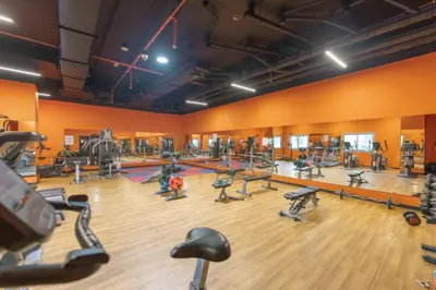 a gym with a lot of treadmills and exercise equipment at Studio with Sunset Views at Dubai Marina in Dubai
