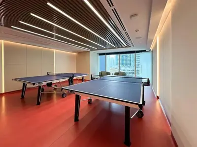 two ping pong tables in a ping pong room at Studio apartment MeDoRe Tower in Dubai