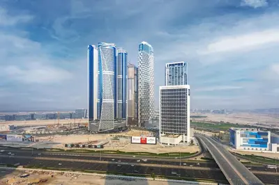 a group of tall buildings in a city at Waves - Stylish 13th-Floor Studio with Top-Notch Amenities in Dubai