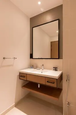 a bathroom with a sink and a mirror at Vida Dubai Marina Residences in Dubai
