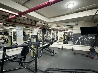 a gym with a bunch of equipment in a room at JuliusHomes - Studio in Bay Square, Business Bay Dubai in Dubai